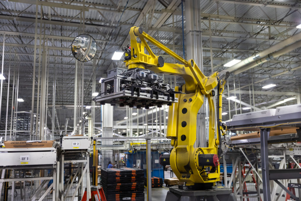 Image of a Robotic machine arm at Valpak.