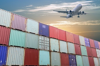 Image of shipping containers and an airplane.