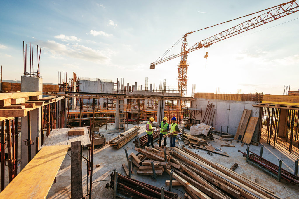 Image of construction workers at a construction site.