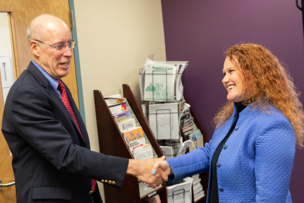 Image of two businesspeople shaking hands.