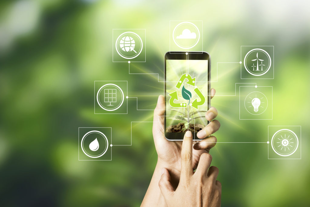 Image of Concept of mobile phones and environmental technology.
